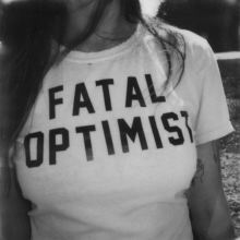 Album cover for Fatal Optimist